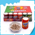 Saldūs tabletės formos saldainiai kolos formos stiklainyje 